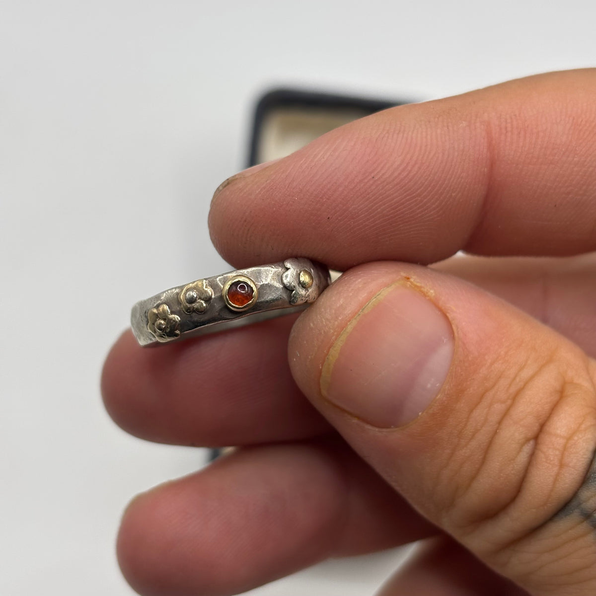 Silver Talma Keshet Garnet Flower Ring (N 1/2)